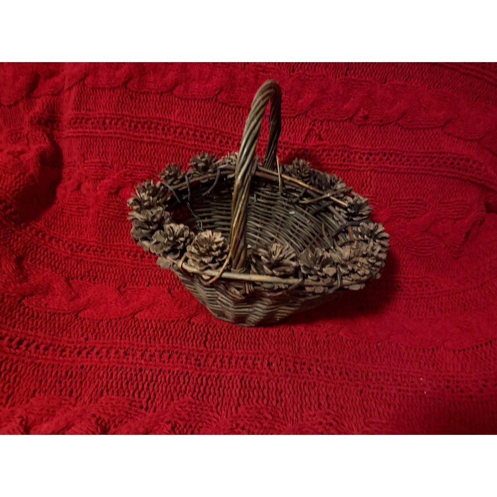 Rustic Woven Wicker Basket with Pine Cone Rim Detail and Arched Handle Brown